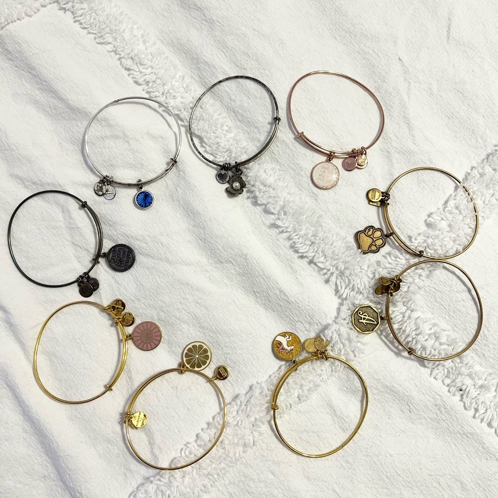Assorted Alex and Ani bracelets (9)